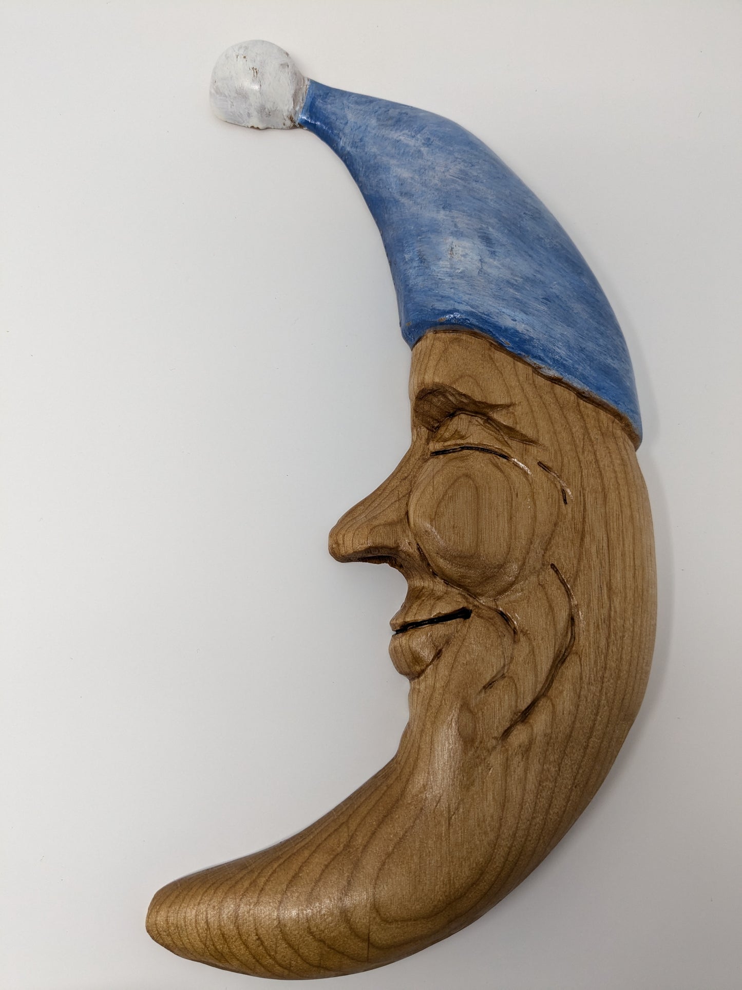 Twin hand carved wooden moons for hanging as wall art in the nursery and kid's rooms