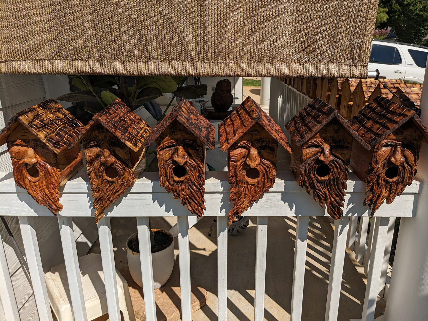 Folk Art Birdhouses and Feeders with Wood Spirit Faces with Round Mouths - Hand Carved Cedar