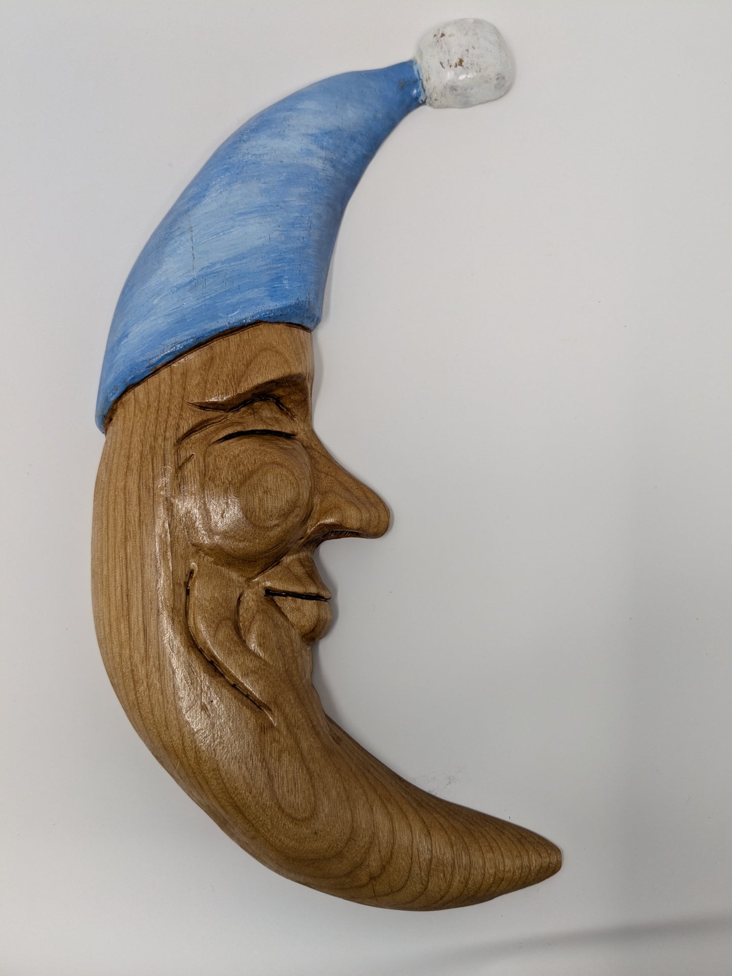 Twin hand carved wooden moons for hanging as wall art in the nursery and kid's rooms