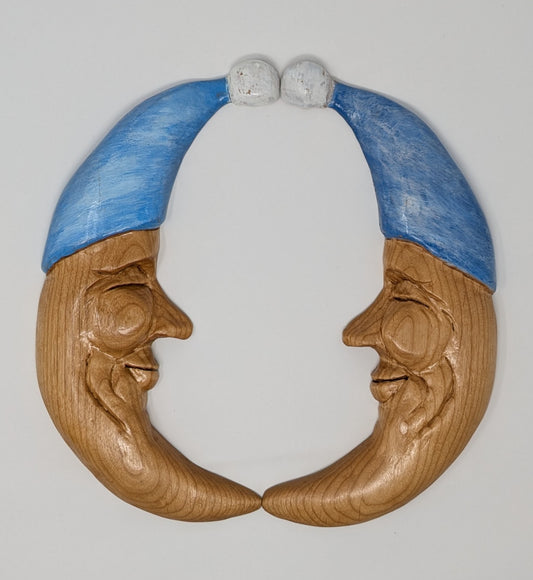 Twin hand carved wooden moons for hanging as wall art in the nursery and kid's rooms